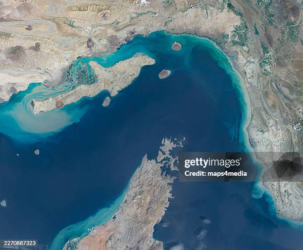 Maps4Media processed and enhanced Sentinal-2 satellite imagery shows a broad view of the Strait of Hormuz between southern Iran and Oman's Musandam...