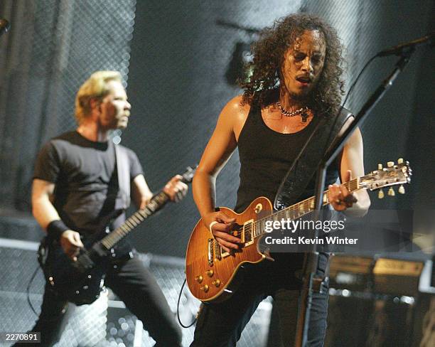 Kirk Hammett and James Hetfield of Metallica perform on stage at the mtvICON: Metallica tribute special held at the Universal Amphitheatre on May...