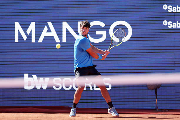 Carlos Alcaraz of Spain in action against Otto Virtanen of Finland during the round of 32 match during the Barcelona Open Banc Sabadell Day 4 at the...