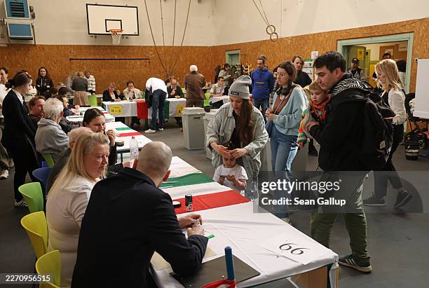 Voters arrive at a polling station to cast their ballots in Hungarian parliamentary elections on April 12, 2026 in Budapest, Hungary. Hungary is...