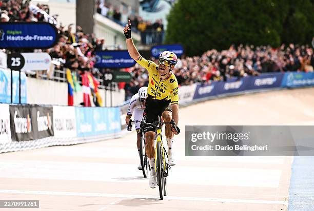 Wout van Aert of Belgium and Team Visma | Lease a Bike celebrates at finish line as race winner ahead of Tadej Pogacar of Slovenia and UAE Team...