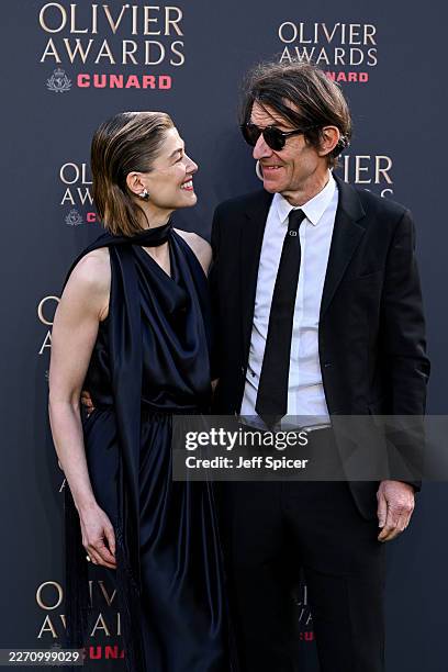 Rosamund Pike and Robie Uniacke attend The Olivier Awards 2026 with Cunard at the Royal Albert Hall on April 12, 2026 in London, England.