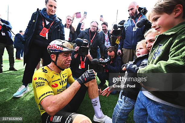 Race winner Wout van Aert of Belgium and Team Visma | Lease a Bike celebrates the victory with his children and wife, Jerome, Georges and Sarah De...