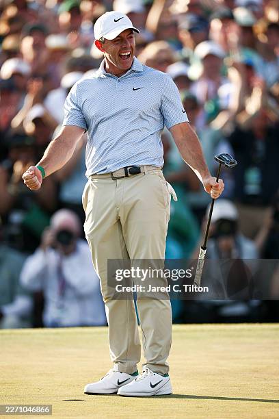 Rory McIlroy of Northern Ireland celebrates winning the 2026 Masters Tournament on the 18th green at Augusta National Golf Club on April 12, 2026 in...
