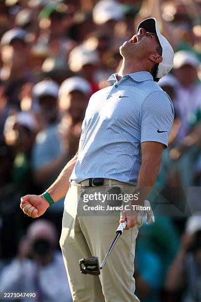 Rory McIlroy of Northern Ireland celebrates winning the 2026 Masters Tournament on the 18th green at Augusta National Golf Club on April 12, 2026 in...