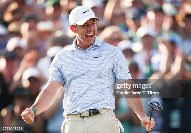 Rory McIlroy of Northern Ireland celebrates winning the 2026 Masters Tournament on the 18th green at Augusta National Golf Club on April 12, 2026 in...