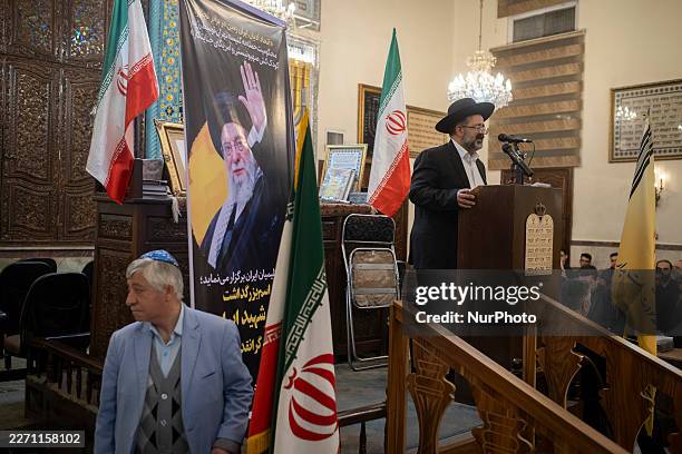 Iranian-Jewish Rabbi Younes Hamami Lalehzar delivers a speech while participating in a prayer ceremony commemorating the death of Iran's late Supreme...
