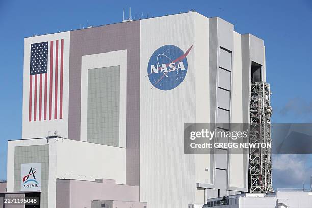 S mobile launcher enters High Bay 3 of the the Vehicle Assembly Building after being rolled back from Launch Pad 39B at the Kennedy Space Center in...