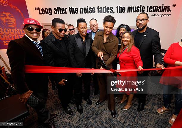 Marlon Jackson, Jackie Jackson, Jermaine Jackson, Mark Spencer, Jaafar Jackson, Yvonne Stokes and Eddie D. Melton attend the ribbon cutting ceremony...