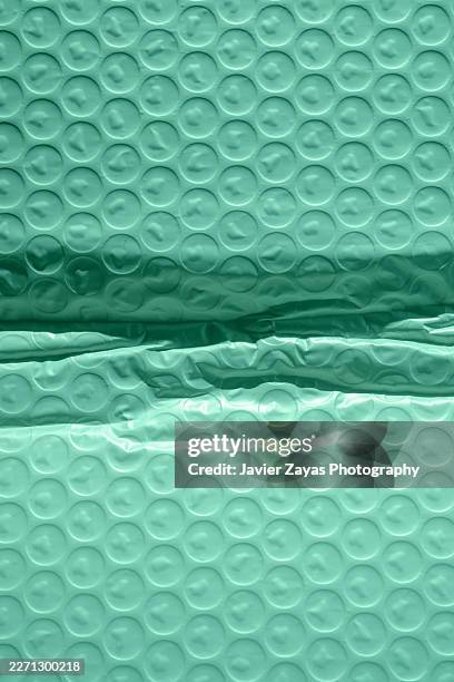 green bubble pack packaging material with texture - flexible packaging stock pictures, royalty-free photos & images