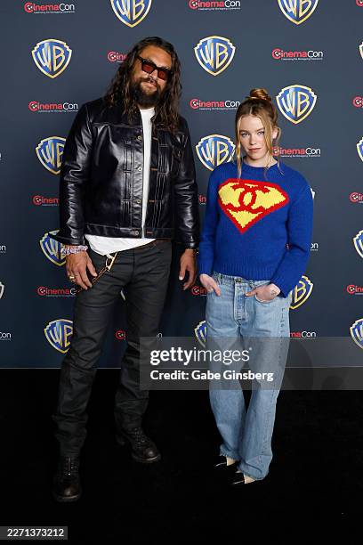 Jason Momoa and Milly Alcock attend the Warner Bros. Pictures presentation at The Dolby Colosseum at Caesars Palace during CinemaCon, the official...