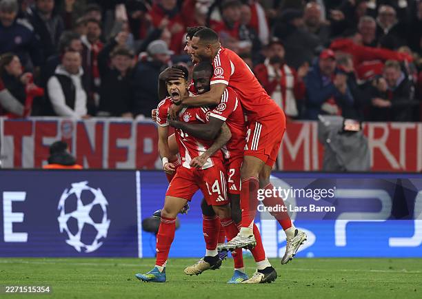 Luis Diaz of FC Bayern Munich celebrates scoring his team's third goal with teammates during the UEFA Champions League 2025/26 Quarter-Final Second...