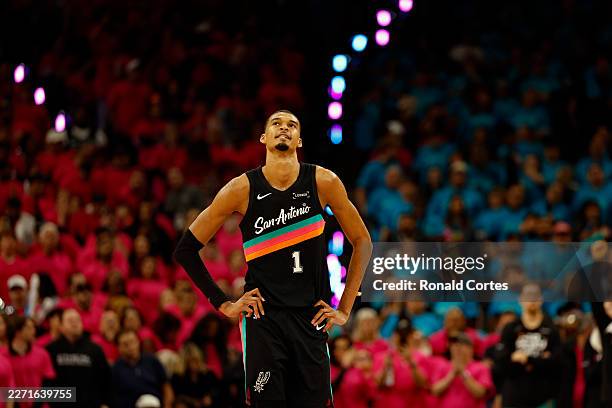 Victor Wembanyama of the San Antonio Spurs looks at the clock during the closing minutes of the second half of Game One of the Western Conference...