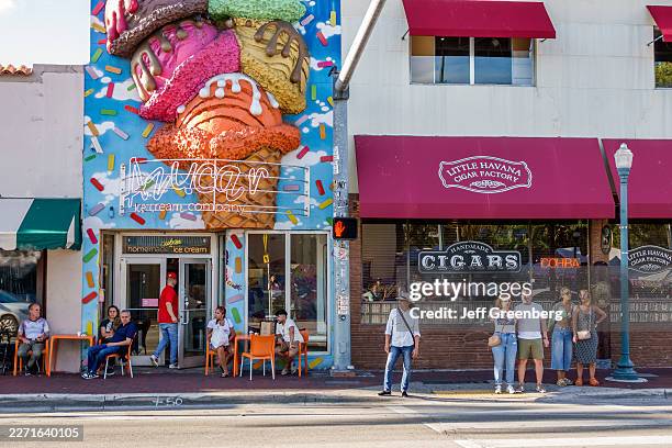 The exterior of the storefronts of Azucar Ice Cream Company next to Little Havana Cigar Factory, Little Havana, Miami, Florida.