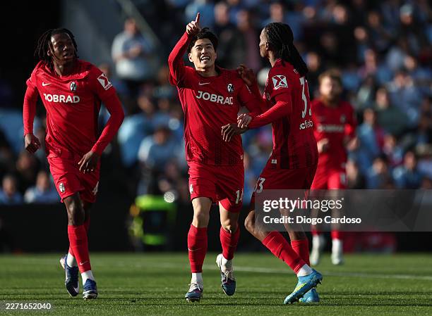 Yuito Suzuki of Sport-Club Freiburg celebrates scoring his team's third goal with teammate Jordy Makengo during the UEFA Europa League 2025/26...
