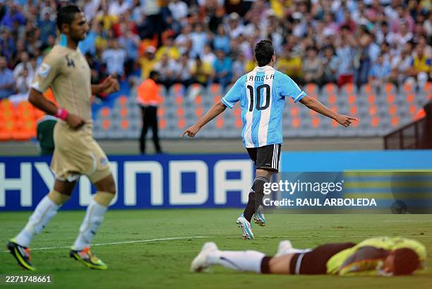 Argentinian player Erik Lamela celebrates after scoring against Egypt during their FIFA Under-20 World Cup football match held at the Atanasio...