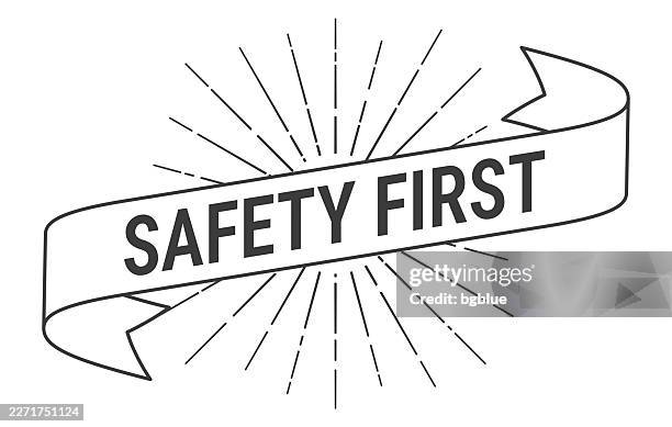 safety first - banner with sunbursts on white background - safety first stock illustrations
