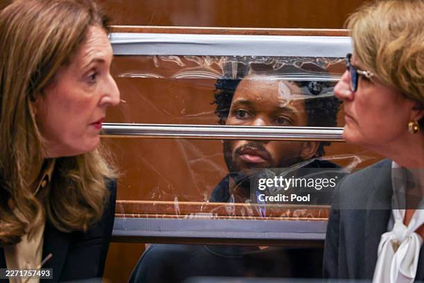 D4vd looks on as defense attorneys Blair Berk and Marilyn Bednarski speak during his arraignment for the murder of Celeste Rivas Hernandez at Clara...