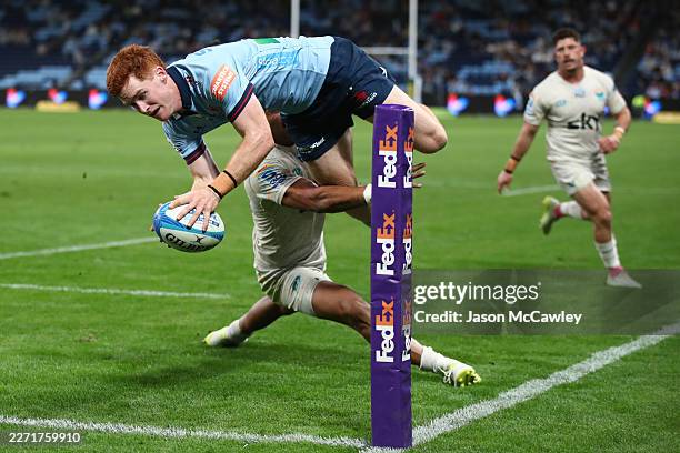 Sid Harvey of the Waratahs scores a try during the round 10 Super Rugby match between NSW Waratahs and Moana Pasifika at Allianz Stadium on April 17,...