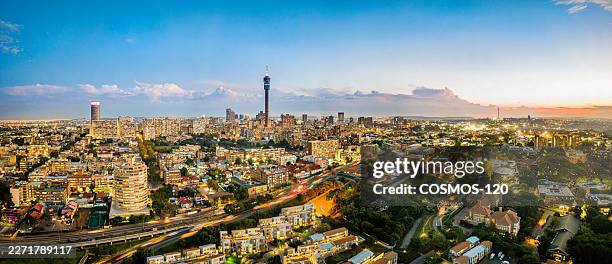sunset panoramic of johannesburg inner city - johannesburg culture stock pictures, royalty-free photos & images