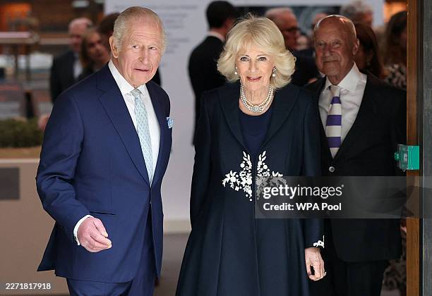 Britain's King Charles and Queen Camilla walk to a reception, during a visit to the British Museum to view the final design for the Queen Elizabeth...