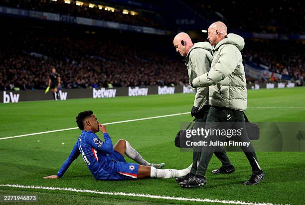 Estevao of Chelsea reacts with an injury during the Premier League match between Chelsea and Manchester United at Stamford Bridge on April 18, 2026...