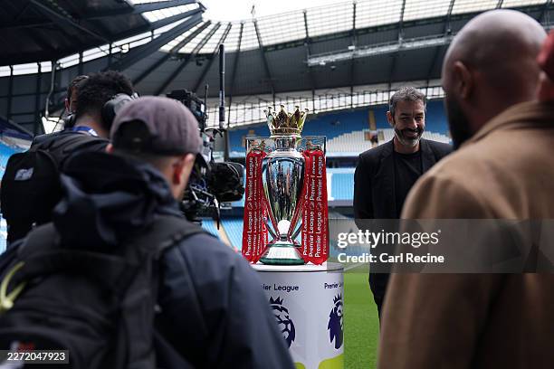 Detailed view of the Premier League trophy dressed up in Red & White ribbons prior to the Premier League match between Manchester City and Arsenal at...