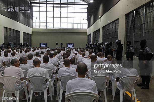 Prison inmates listen during a massive hearing against criminals and gang members at CECOT on April 23, 2026 in Tecoluca, El Salvador. In 2023, El...