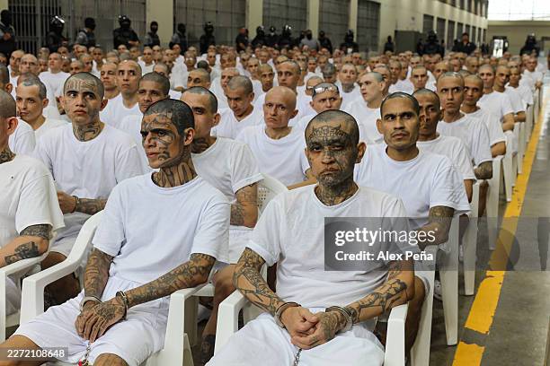 Prison inmates listen during a massive hearing against criminals and gang members at CECOT on April 23, 2026 in Tecoluca, El Salvador. In 2023, El...
