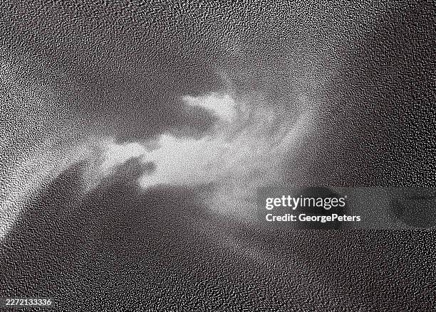defocused background. storm clouds and breaking waves. - dark storm clouds stock illustrations