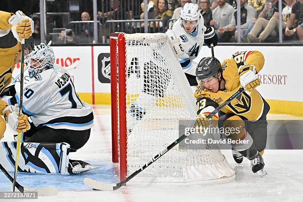 Mitch Marner of the Vegas Golden Knights attempts a wraparound against Karel Vejmelka of the Utah Mammoth during the third period in Game One of the...