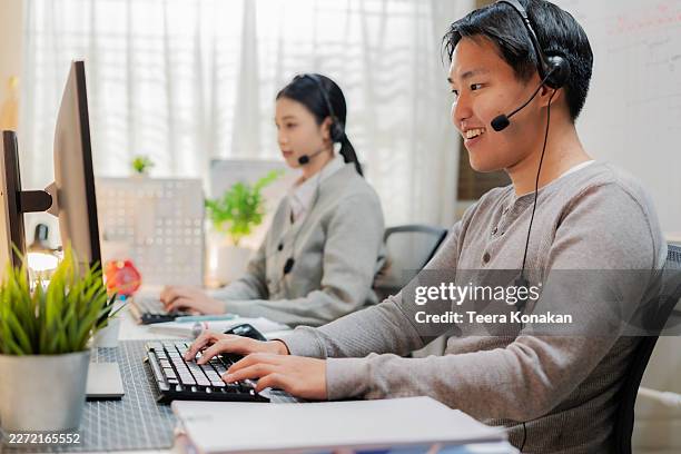customer support agents using headsets and computers in office, analyzing dashboard data and providing online service. - providing service stock pictures, royalty-free photos & images