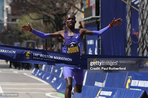 John Korir of Kenya crosses the finish line to win the Men's division of the 130th Boston Marathon in 2:01:52 on April 20, 2026 in Boston,...