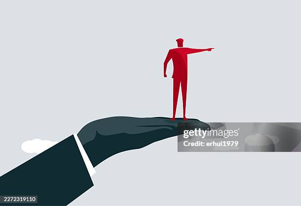 giant hand supporting leader pointing the way forward - big decision stock illustrations