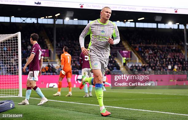 Erling Haaland of Manchester City celebrates scoring his team's first goal during the Premier League match between Burnley and Manchester City at...