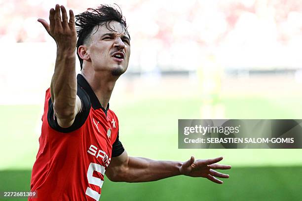 Rennes' French forward Esteban Lepaul celebrates scoring his team's first goal during the French L1 football match between Stade Rennais FC and FC...