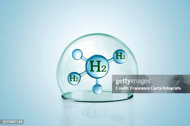 h2 hydrogen icon inside a bell jar - domed serving tray stock pictures, royalty-free photos & images