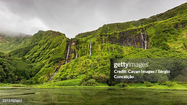 several waterfalls in a green landscape in azores - ponta delgada stock pictures, royalty-free photos & images