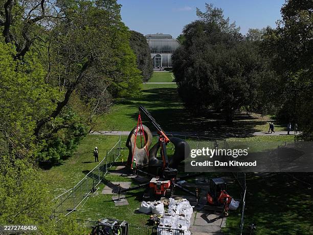 Henry Moore sculpture entitled 'Double Oval' is installed as part of a new exhibition at Kew Gardens on April 23, 2026 in London, England. Opening in...