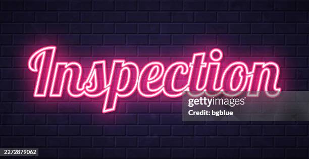 inspection - glowing neon text on brick wall background - looking over wall stock illustrations
