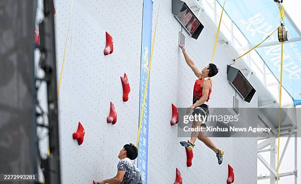 Long Jianguo of China competes during the men's individual qualification of sport climbing speed at the 6th Asian Beach Games in Sanya, south China's...