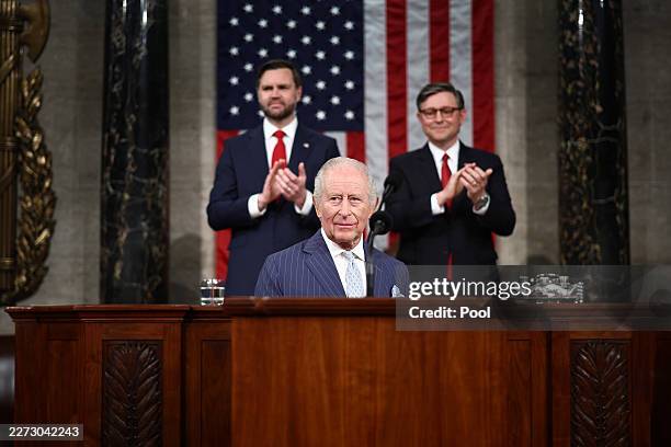 Britain's King Charles III is applauded by U.S. Vice President JD Vance and U.S. House Speaker Mike Johnson as he arrives to address a Joint Meeting...