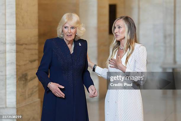 Britain's Queen Camilla speaks to US actress Sarah Jessica Parker as she attends a literacy event at the New York Public Library on April 29 in New...