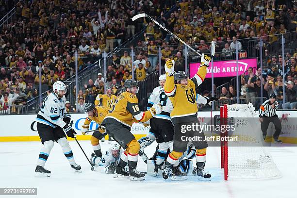 Pavel Dorofeyev and Mitch Marner of the Vegas Golden Knights celebrate Dorofeyev's goal against the Utah Mammoth during the third period of Game Five...