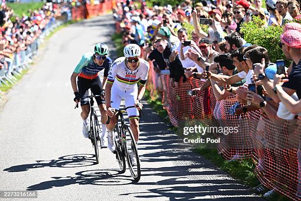 Paul Seixas of France and Team Decathlon CMA CGM and Tadej Pogacar of Slovenia and UAE Team Emirates - XRG compete in the breakaway during the 112th...