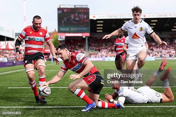 Tomos Williams of Gloucester goes over to score a try during the Gallagher PREM match between Gloucester Rugby and Exeter Chiefs at Kingsholm Stadium...