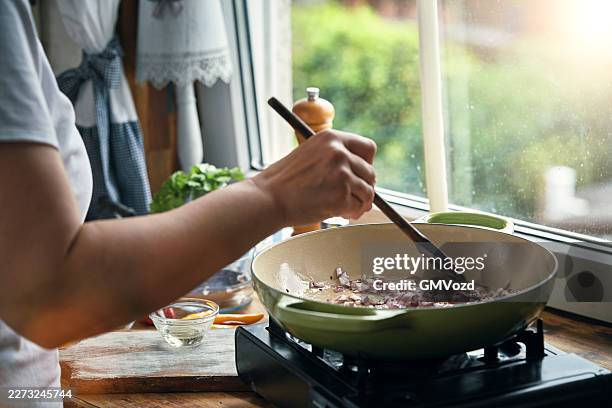 preparing indian chicken curry in domestic kitchen - butter chicken stock pictures, royalty-free photos & images