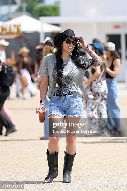 Festivalgoers attend the 2026 Stagecoach Festival at Empire Polo Club on April 26, 2026 in Indio, California.