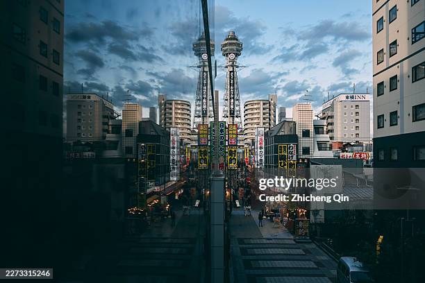 tsutenkaku tower during the blue hour - osaka prefecture stock pictures, royalty-free photos & images
