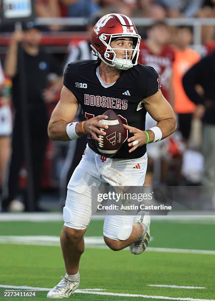 Josh Hoover of the Indiana Hoosiers scrambles during the 2026 Indiana Spring Football Game at Memorial Stadium on April 23, 2026 in Bloomington,...